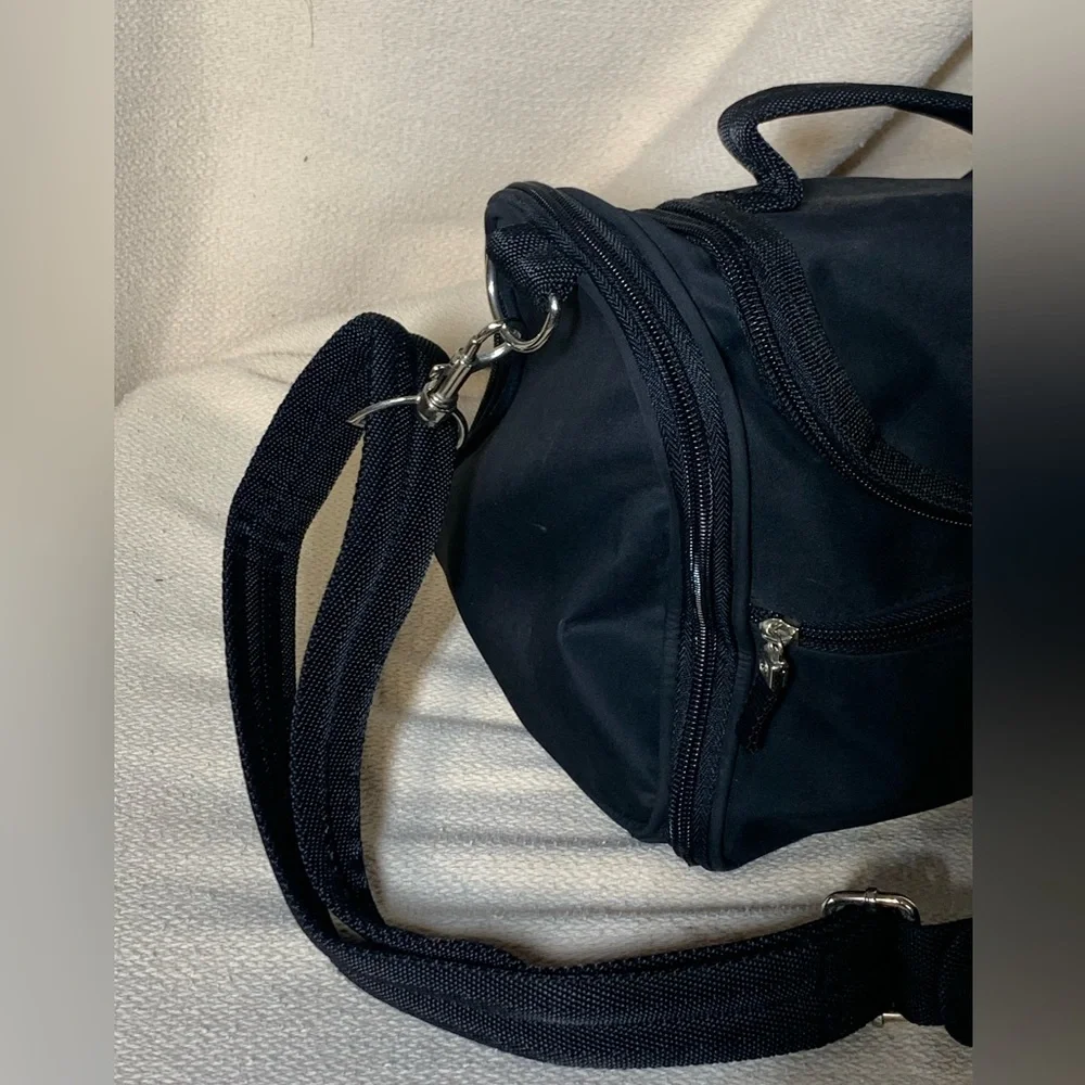 black travel bag for make up or toiletries
